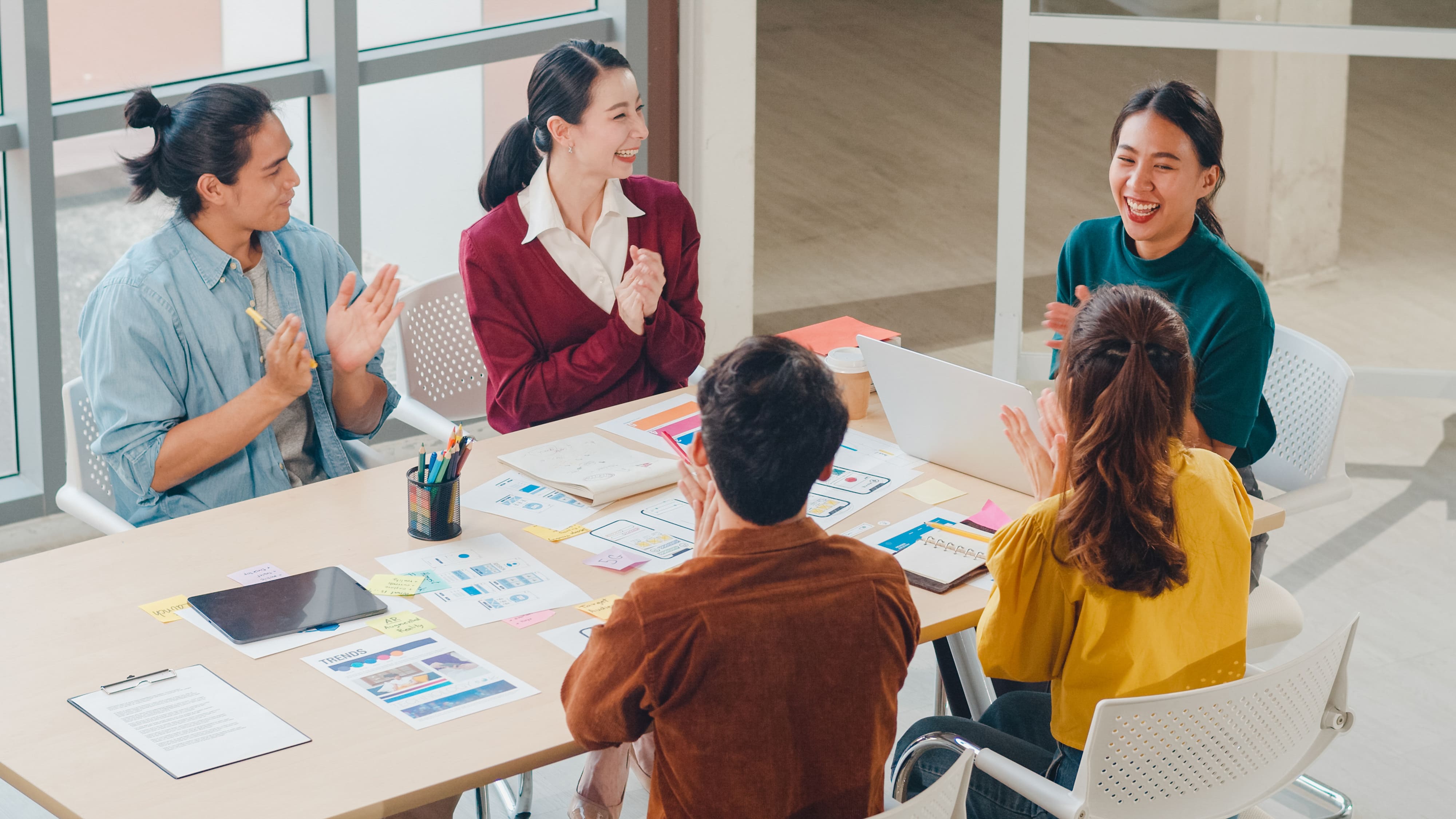 multiracial-group-asia-young-creative-people-smart-casual-wear-discussing-business-clapping-laughing-smiling-together-brainstorm-meeting-office-coworker-teamwork-successful-concep t